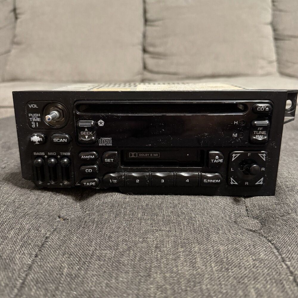 1987 - 2002 Dodge Jeep Chrysler Radio CD Cassette Player P04704383AF OEM Broke